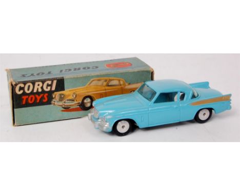 Corgi Toys, 211 Studebaker Golden Hawk, blue body with gold flash, flat spun hubs, in the original blue and yellow all-card b