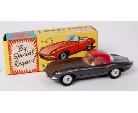 Corgi Toys, 307 Jaguar E type, metallic grey body with red removable hard top with brown interior and spun hubs, in the origi