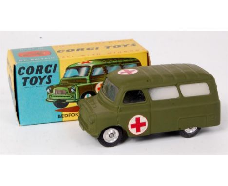 Corgi Toys, 414 Bedford Dormobile military ambulance, olive drab body with Red Cross stickers, shaped hubs, no suspension, in