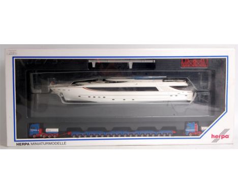 Herpa, 1/87th scale heavy transport set comprising of; a Catwalk Mega Yacht in transport mode, with Volvo tractor units and m