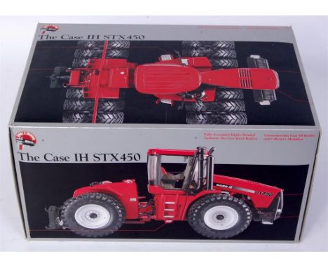 ERTL Precision Series 2, 1/32nd scale diecast model of a CASE IH STX 450 tractor, finished in red, in the original polystyren