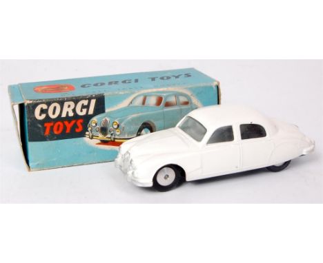 Corgi Toys, 208 Jaguar 2.4 litre saloon, white body with flat spun hubs, in the original blue and yellow all-card box (VG, BG