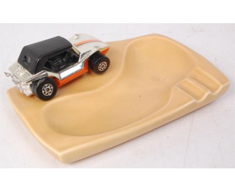 Matchbox Kingsize, promotional ashtray, comprising of light tan pottery ashtray surmounted with a Matchbox Kingsize K-37 sand