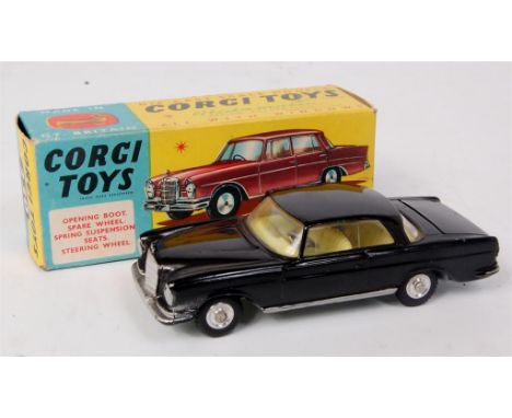 Corgi Toys, 230 Mercedes Benz 220 SE, black body with lemon interior, spun hubs, spare wheel in boot, silver detailing, in th