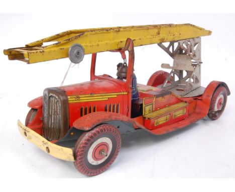 Mettoy large tinplate clockwork Fire Engine - finished in red, with detailed tin printing, with extending and elevating ladde