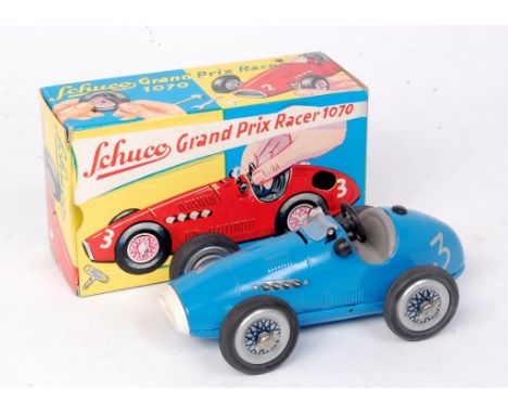 Schuco, No.1070 Grand Prix Racer, tinplate and clockwork example, finished in blue with racing number 3, includes accessories