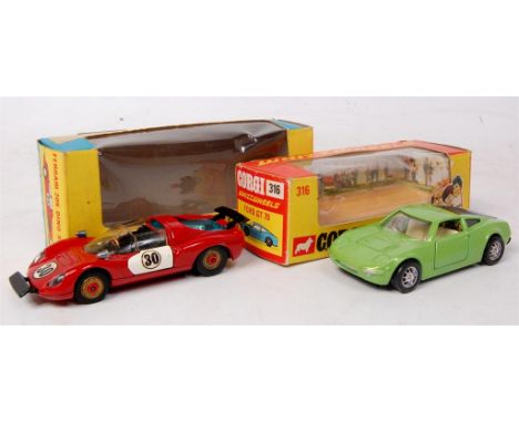 Corgi Toys boxed group, to include No.316 Ford GT70, green body with whizzwheels, in the original yellow and orange window bo