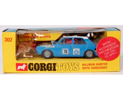 Corgi Toys, 302 Hillman Hunter Rally, blue body with white roof, matt black bonnet, with equipment and kangaroo figure, in th