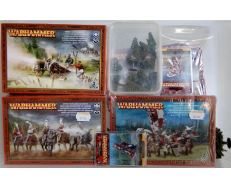 A collection of Warhammer Empire boxed as issued wargaming miniatures and related accessories to include; Empire handgunners,