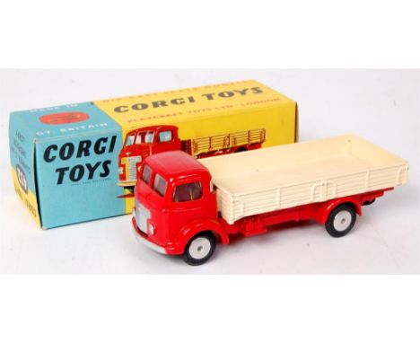 Corgi Toys, Commer dropside lorry, red cab and chassis with smooth hubs in the original blue and yellow all-card box, with le