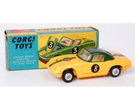 Corgi Toys, 319 Lotus Elan S2 open top Coupe, yellow body with green stripe and roof, with cream interior, spun hubs, racing 