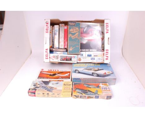 16 mixed scale aircraft and motor vehicle plastic and metal kits by Burago, Monogram, Jo-Han, Airfix etc, all appear unmade, 