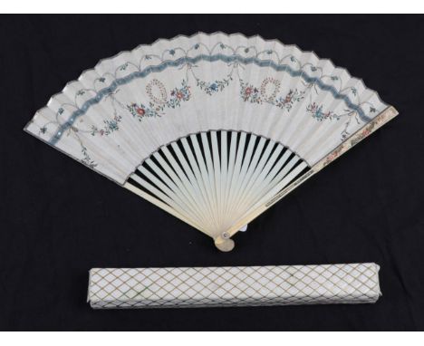 An 18th Century Ivory Fan, the monture very fine and slender, the gorge plain, the upper guards carved and painted with flowe