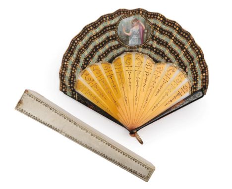 Circa 1910, An Unusual Tortoiseshell Fan of Ballon Form, the guards dark and mottled, the gorge blond, all piqué in a mainly 