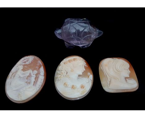 Three carved shell cameos, two of female busts; and one of mother with child, she playing a harp; and a 'rock crystal' tortoi