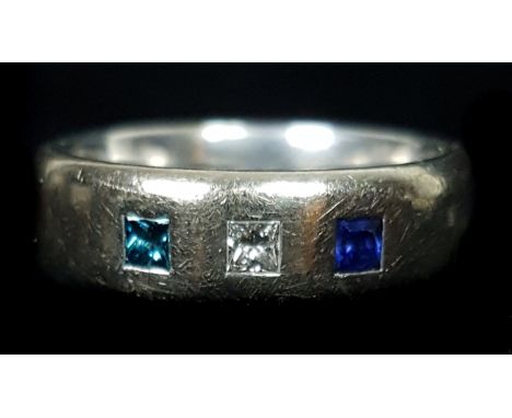 An 18ct white gold court band, pave set with a single sapphire, diamond and aquamarine, ring size S