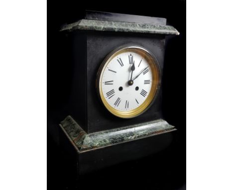 A black slate mantel clock with variegated green marble details, modern quartz movement, 33cm high