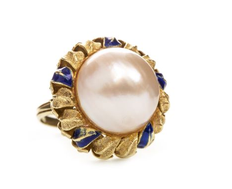 PEARL DRESS RING, set with a large split pearl 17mm diameter, to an enamelled open setting with foliate motifs, unmarked, siz