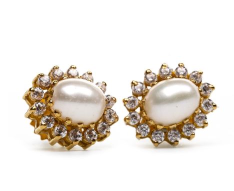 PAIR OF PEARL AND GEM SET CLUSTER EARRINGS, each set with an oval pearl within a white gem set halo, with screwback fittings,