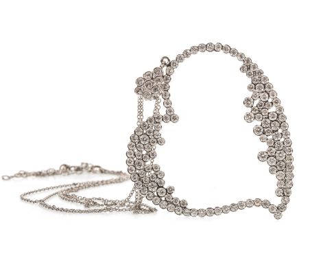 DIAMOND SET HEART SHAPED PENDANT, the heart 50mm high, set with round brilliant cut diamonds, suspended from a flower cluster