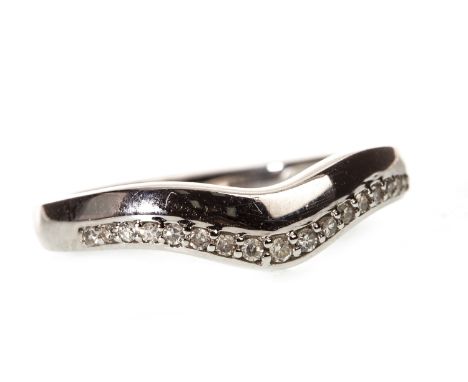 SHAPED DIAMOND SET BAND, of tapered and curved form, 30mm at widest point, set with a row of single cut diamonds, in nine car