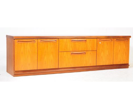 G-Plan Furniture - A vintage mid 20th century circa 1970s teak low sideboard credenza. Of rectangular form with two deep cent