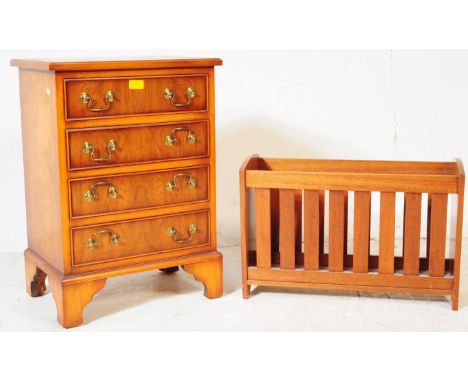 A George III revival mahogany chest of drawers. The chest of drawers having a bank of four drawers each with brass swan neck 