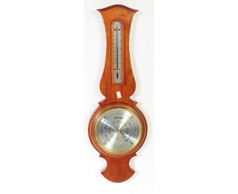 20th century Comitti of London aneroid barometer having silvered dial with thermometer to the neck. Measures approx. 59cm x 2