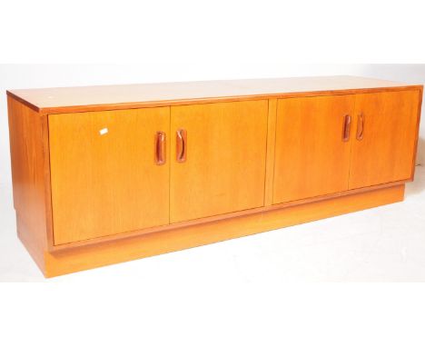 G- Plan Furniture&nbsp; -&nbsp; A retro mid 20th century teak wood sideboard credenza. Of rectangular shape with two sets of 