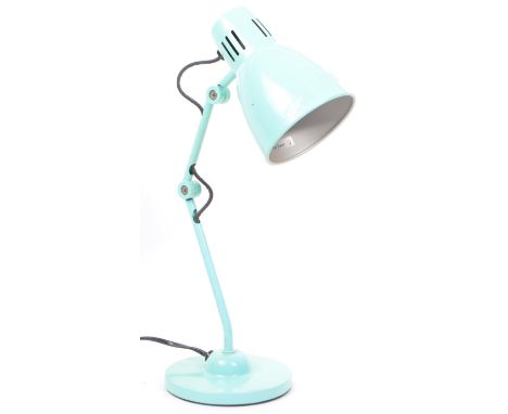 A contemporary turquoise industrial desk table lamp light. Of metal construction with conical shade, dual hinged joints on a 