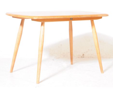 Ercol - British Modern Design - A retro mid century elm wood Ercol plank coffee / occasional table. Having a rectangular plan