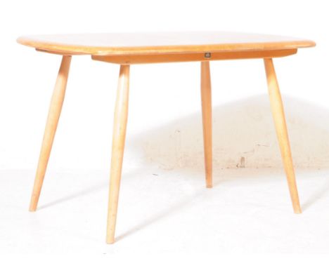 Ercol - British Modern Design - A retro mid century elm wood Ercol plank coffee / occasional table. Having a rectangular plan