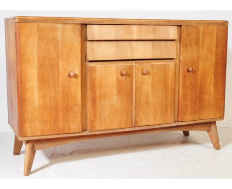 Nathan Furniture - British Modern Design - A mid 20th century teak wood sideboard wall unit. Rectangular form with two centra