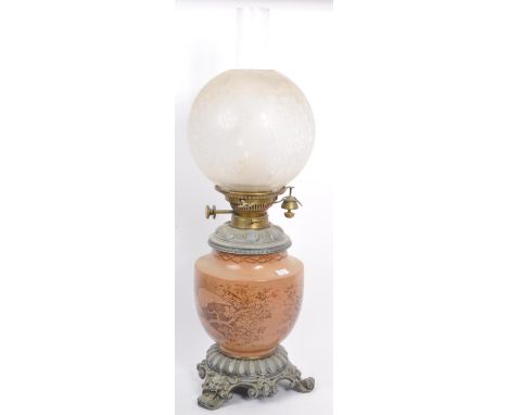 Victorian 19th century brass &amp; amber glass oil lamp. The lamp with amber glass body having acid etched shade and flue mou
