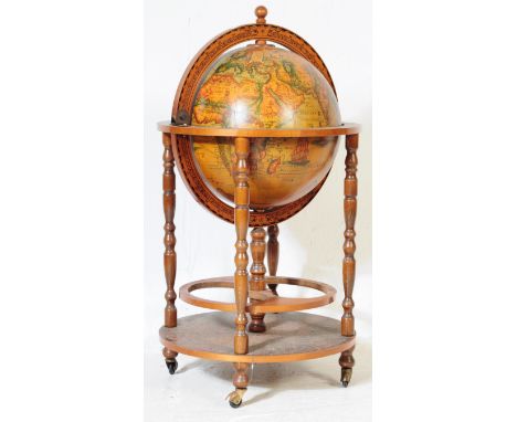 A 20th Century vintage terrestrial mahogany veneer globe drinks cabinet with hinged lid to reveal decanter cocktail cabinet, 