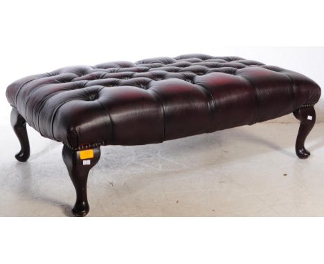 A large early 20th century circa 1920s chesterfield leather button back ottoman / footstool / pouffe end of bed seat. Rectang