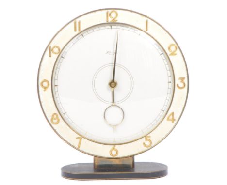 Heinrich M&ouml;ller - Kienzle - An early 20th century circa 1930s Art Deco German mantel clock. The clock having a white fac