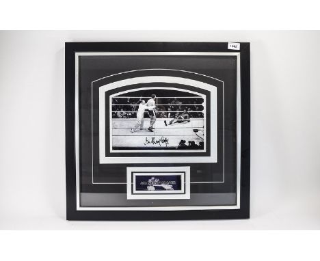 Boxing Interest. Signed photo Sir Henry Cooper. Black glazed frame. Ideal collectors or charity auction item. Overall size in