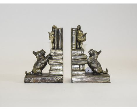 Vintage Metal Bookends. A pair in the form of cats playing on a pile of books. Made of cast plated metal, marked Japan. Heigh