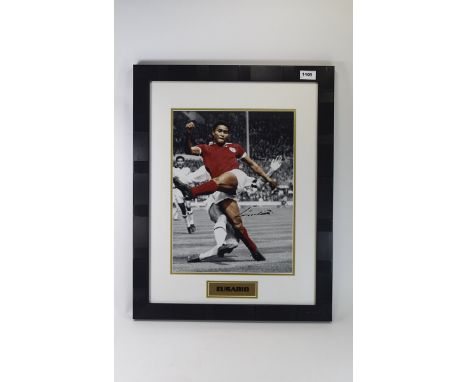 Football Interest. Signed photo of Eusabio, Portugal complete with 'True Colours' Certificate of Authenticity. Black frame & 