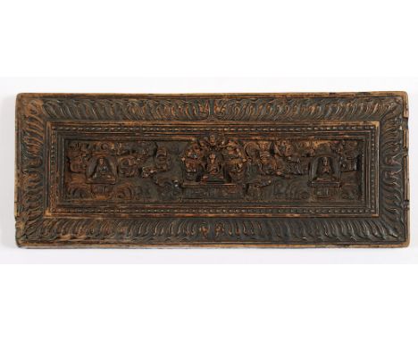 beschnitzter Buchdeckel für ein Manuskript, Holz, im vertieften Relief drei Buddhadarstellungen, 14,5 x 36,5, min.besch., Tib
