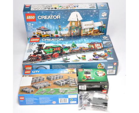 Lego Creator Sets comprising 10259 Winter Village Station, 10254 Winter Holiday Train 60205 Train Track plus 40425 BrickHeadz