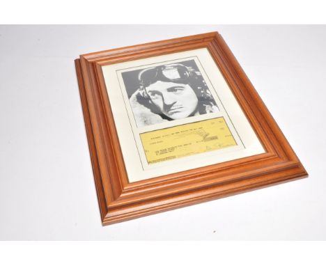 Autographs. A framed and signed photograph and signed cheque from David Niven. With COA. 