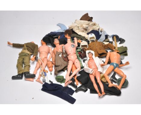 An assortment of vintage action man comprising dolls, clothing and accessories. Mostly spares or repair.