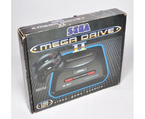 Sega Mega Drive II Video Game console, looking mostly complete with cables, controllers, additional memory cards etc. As show