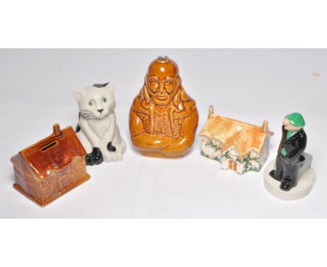 A group of ceramic collectables comprising Mr T (A-Team), Andy Capp and others as shown. Some money banks.