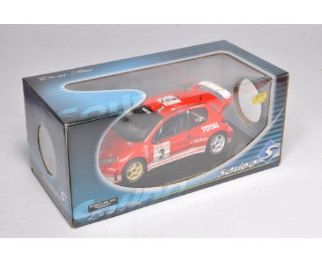 Solido 1/18 diecast model vehicle comprising WRC Peugeot 206, Richard Burns. Excellent in box.