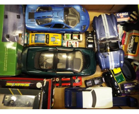 Diecast Models - a good mixed lot of diecast model motor vehicles to include Guitoy, Maisto, Tough Road, Scalextric car, Soli
