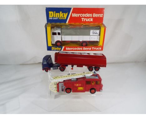 Dinky Toys - A boxed Dinky Toys # 940 Mercedes Benz Truck, white cab and trailer, red chassis and hub, appears mint in origin