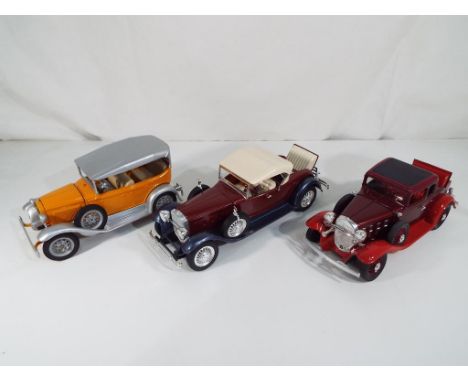 Hubley Models - three Hubley Models metal kit cars to include 1932 Chevrolet 5-window Sport Coupe, 1930 Packard Roadster and 